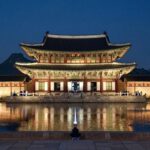 창경궁 야간 특별관람 시 명정전과 화려한 조명이 비치는 연못 풍경